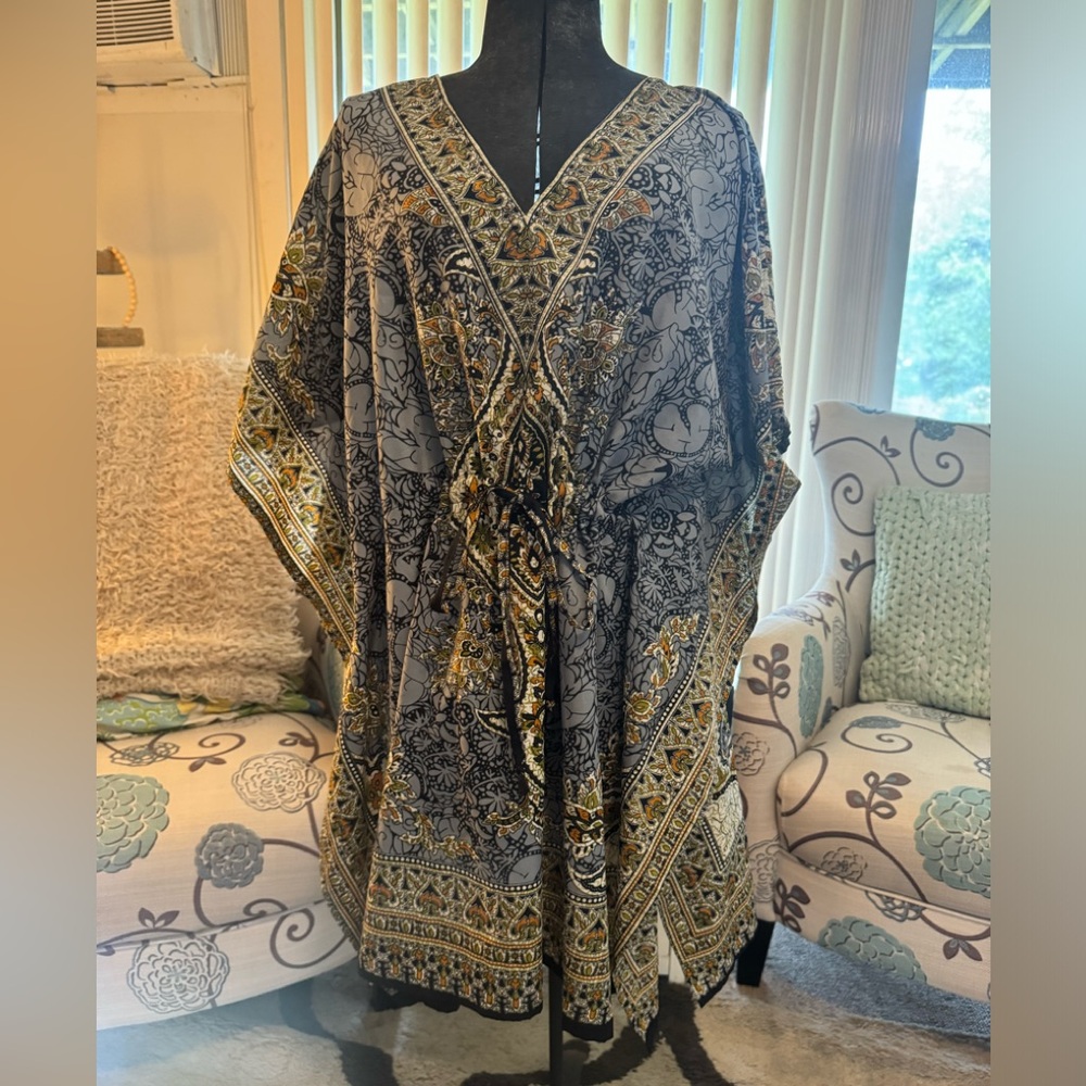 Loose fitting top with draw string waist line
